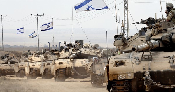Israeli Merkava tanks withdrawing from the Gaza Strip.